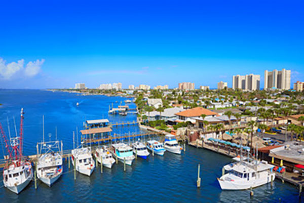 Scenic park and waterfront walkway in Port Orange, Florida with lush greenery and calm water. Scenic park and waterfront walkway in Port Orange, Florida with lush greenery and calm water.
